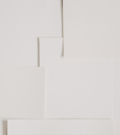 Stack of elegant printable designs with minimalist patterns and typography.