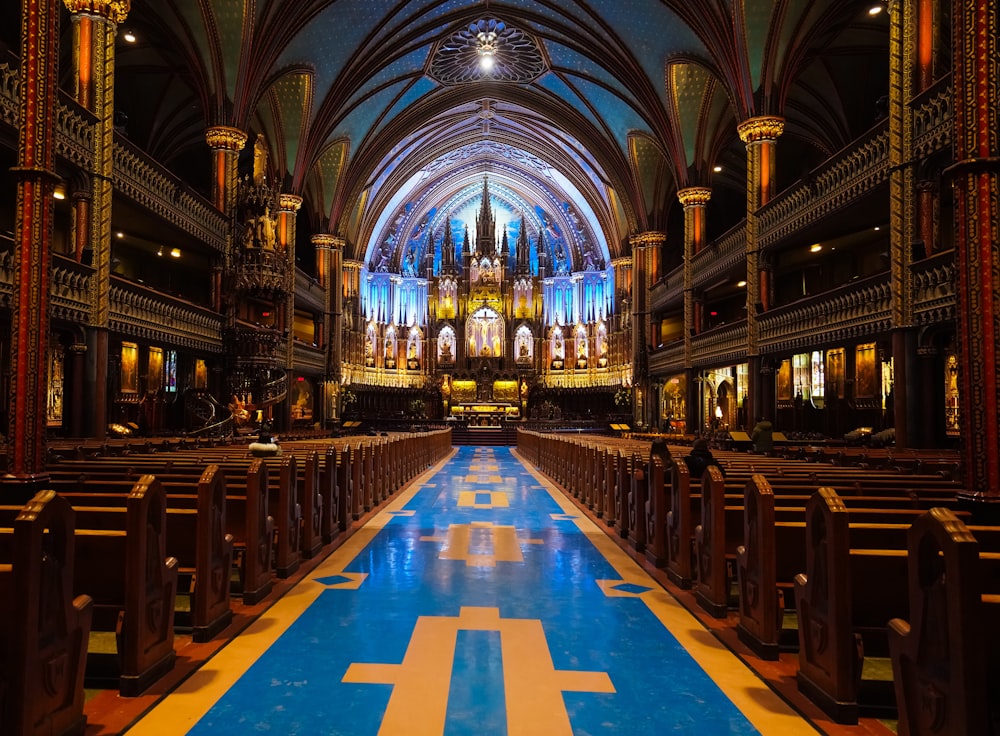 a large cathedral with a blue and yellow floor