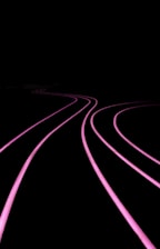 a black and pink photo of a train track