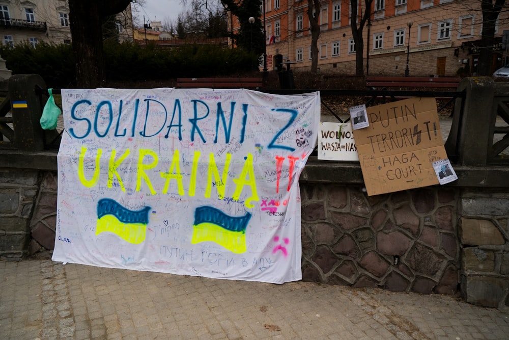 a sign on the side of a road that says solidarity 2 ukraine