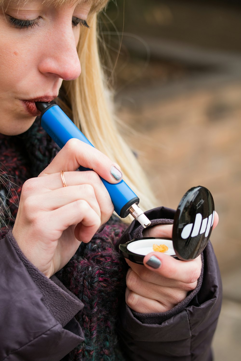 a woman holding a cell phone to her ear