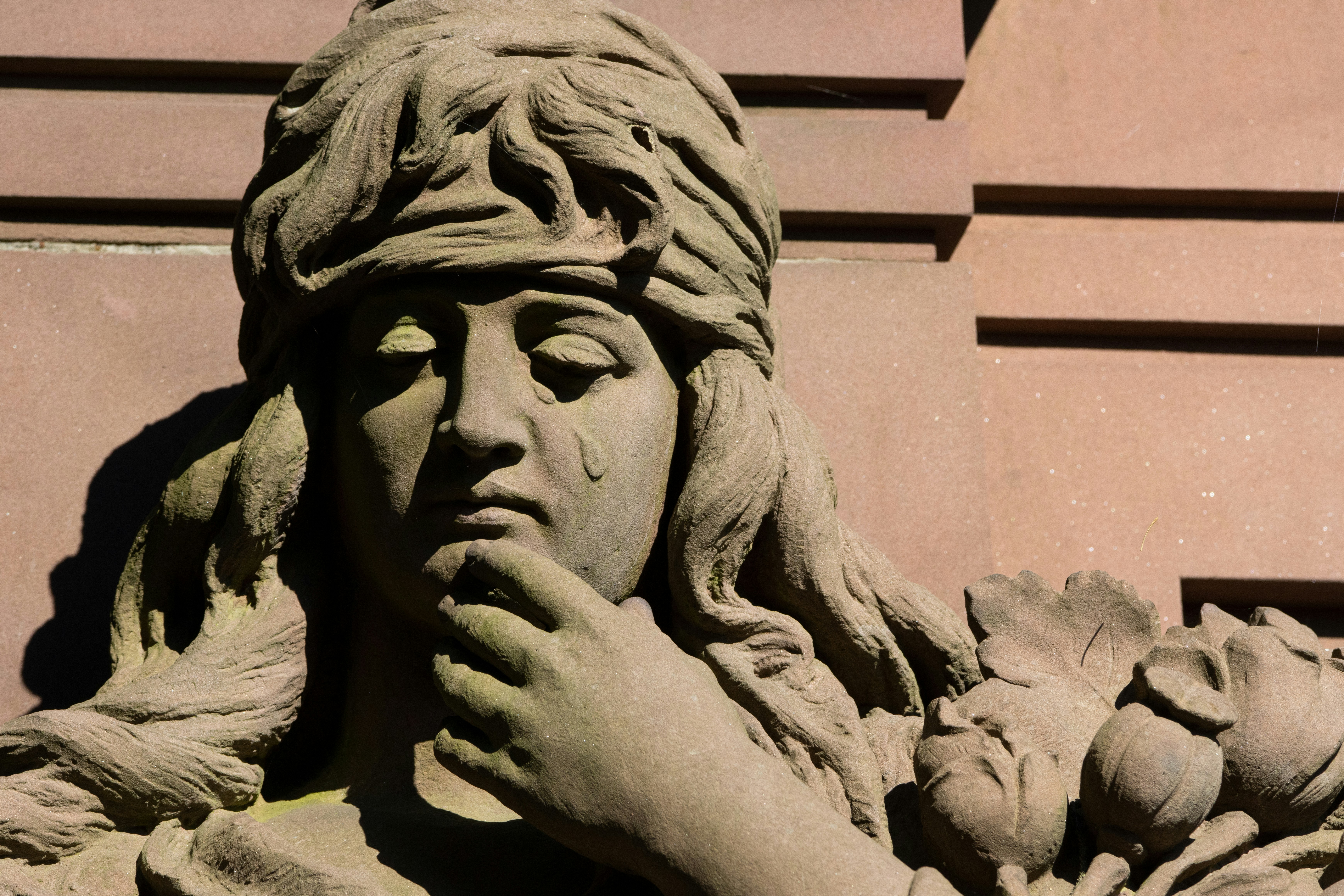 a close up of a statue of a woman