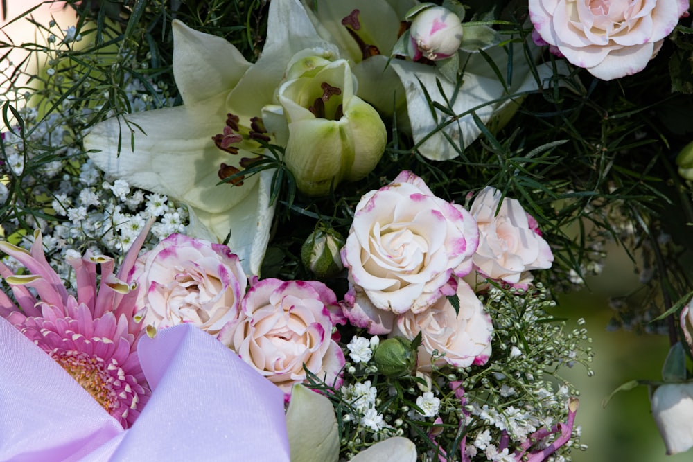 a bunch of flowers that are sitting on a table