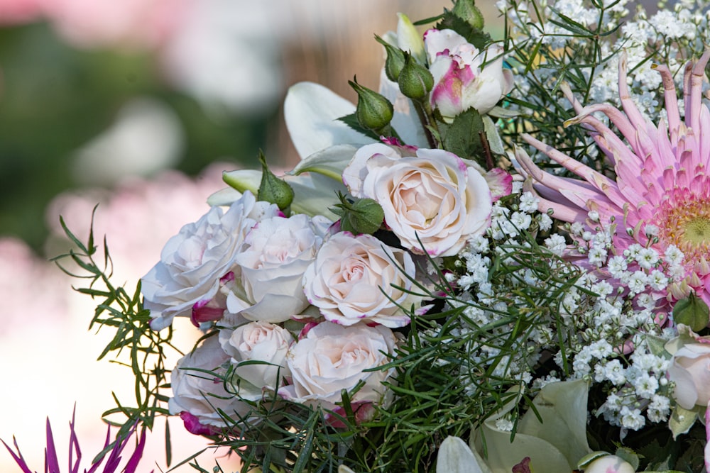 a bouquet of flowers sitting on top of a table