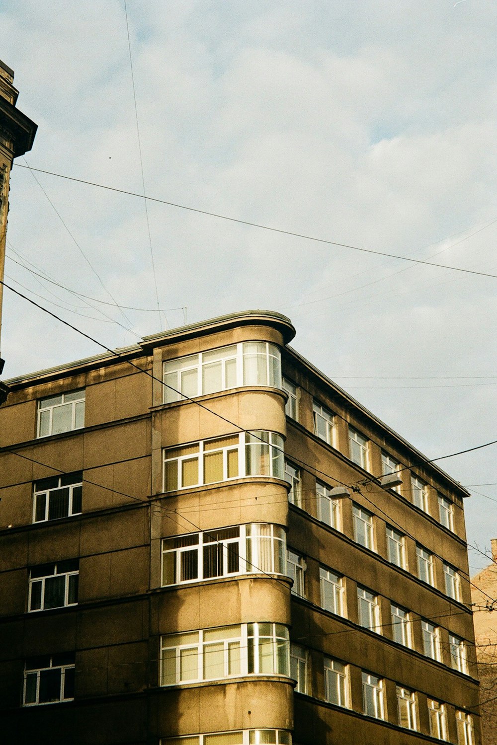 a tall building with a clock on the top of it