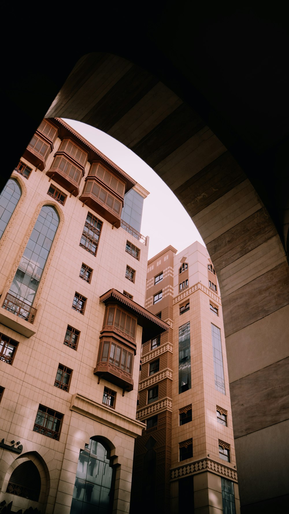 a view of a building through an arch