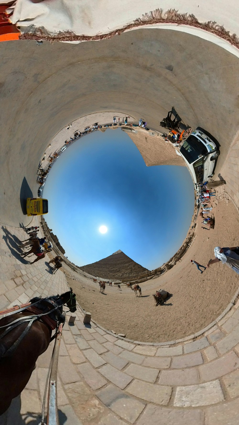 a fish - eye view of a parking lot with cars parked in it