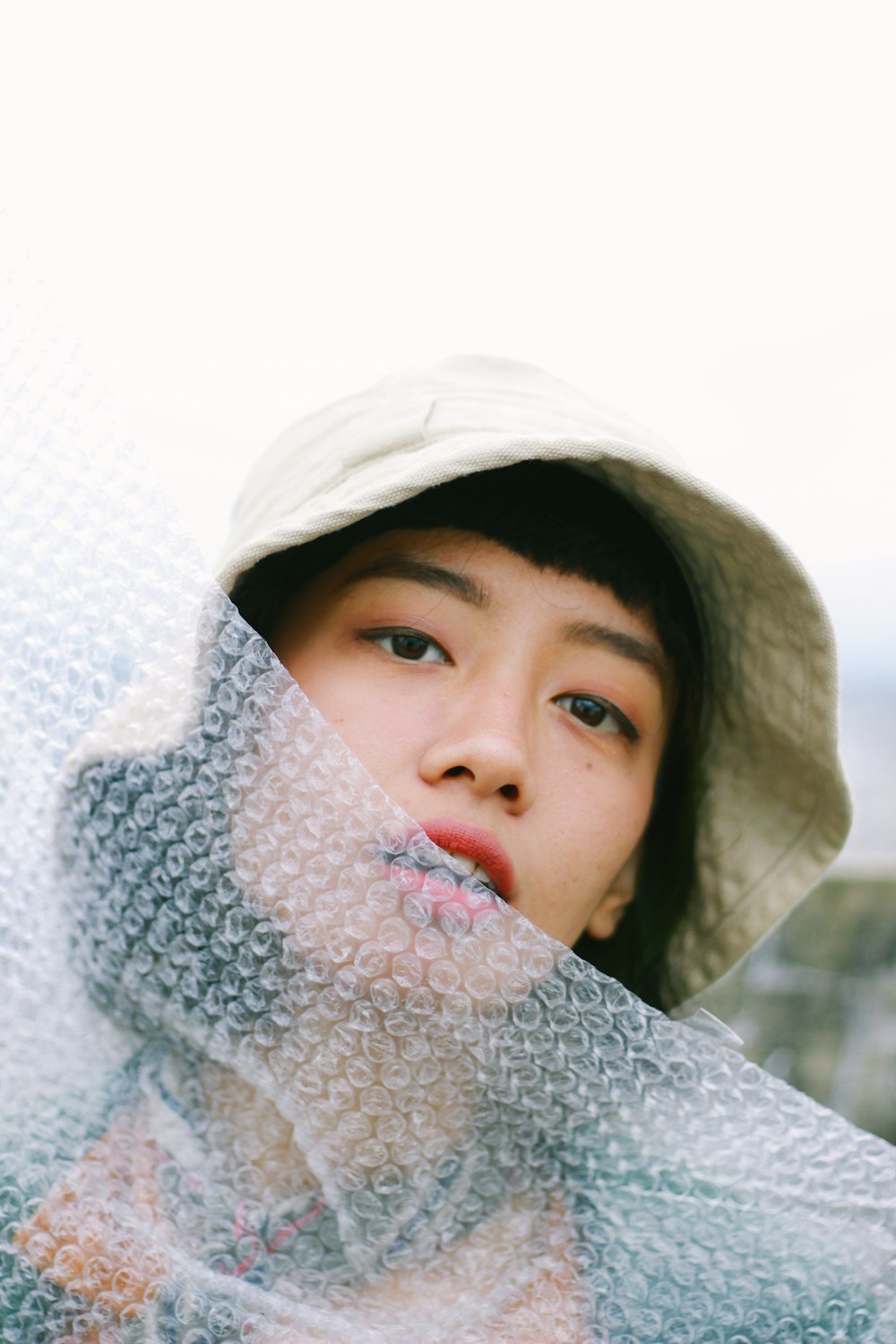 a close up of a person wearing a hat