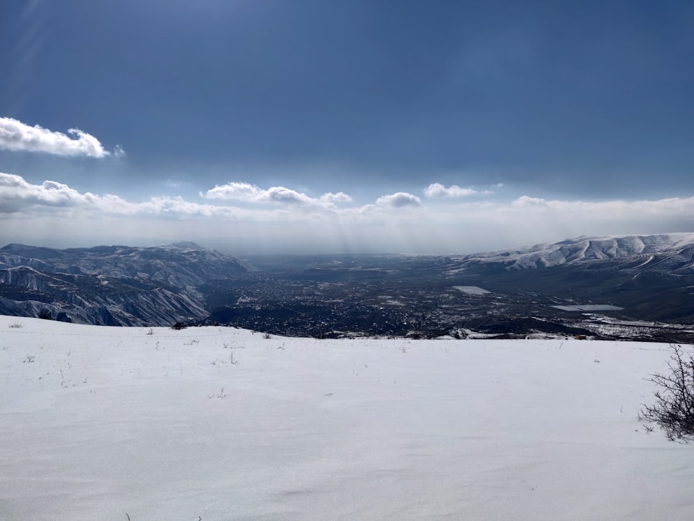 a view of the mountains from a ski slope