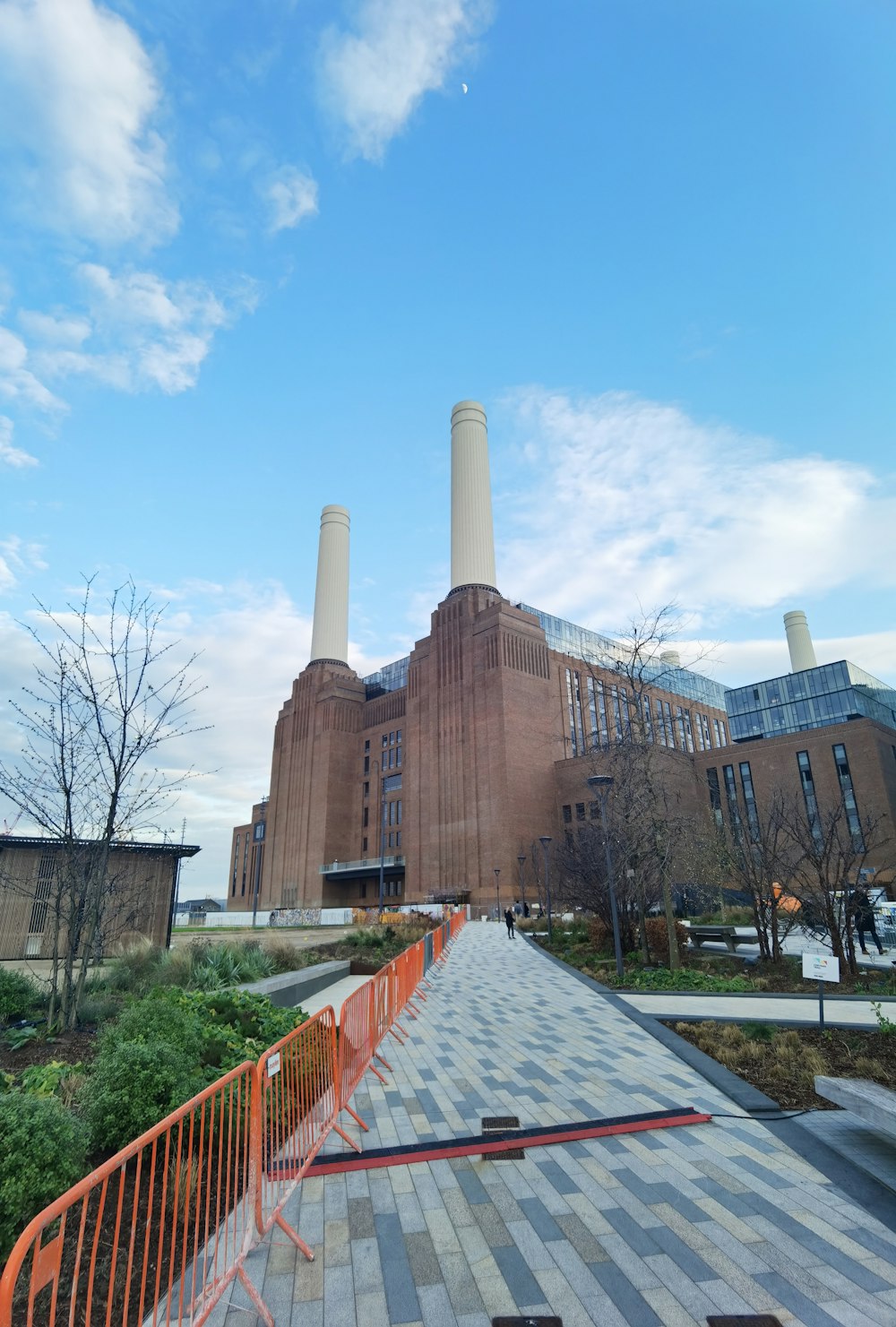 a large brick building with two towers on top of it