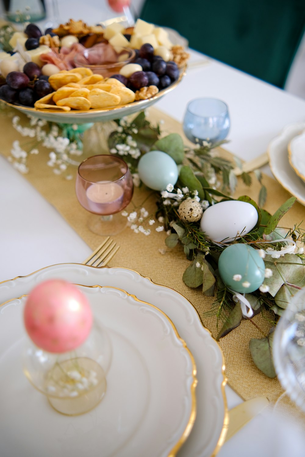 a table topped with plates and bowls filled with food