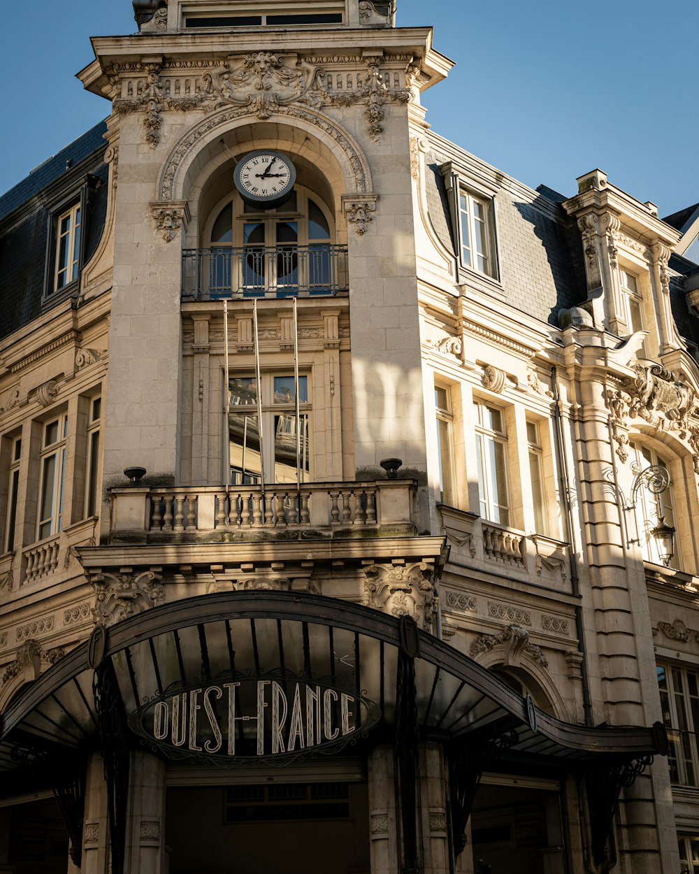 a building with a clock on the top of it