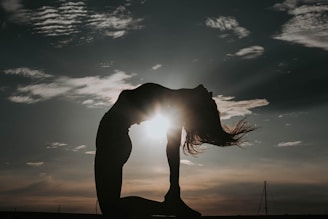 tock image of a yoga practitioner performing yoga asanas