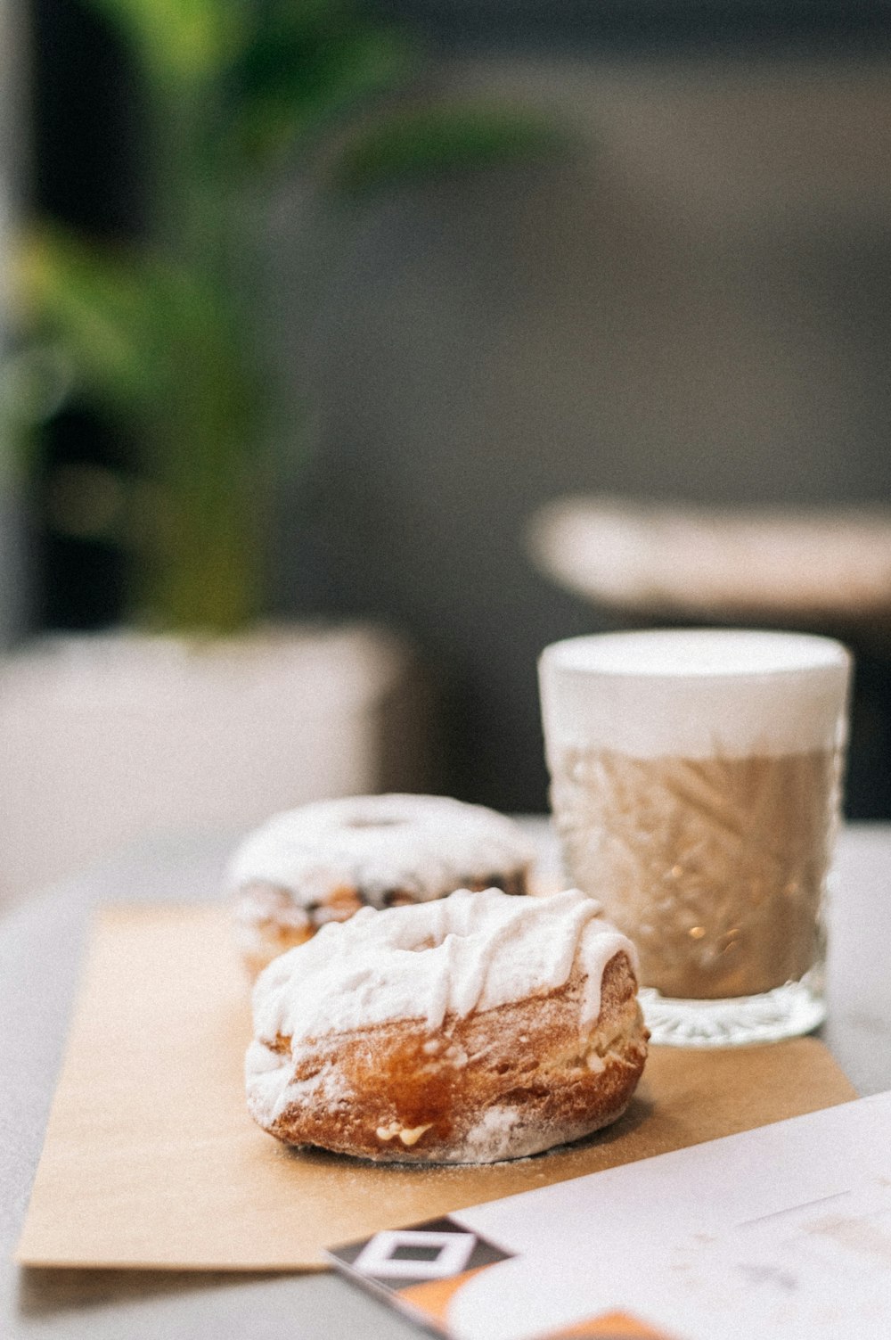 a couple of doughnuts sitting on top of a table