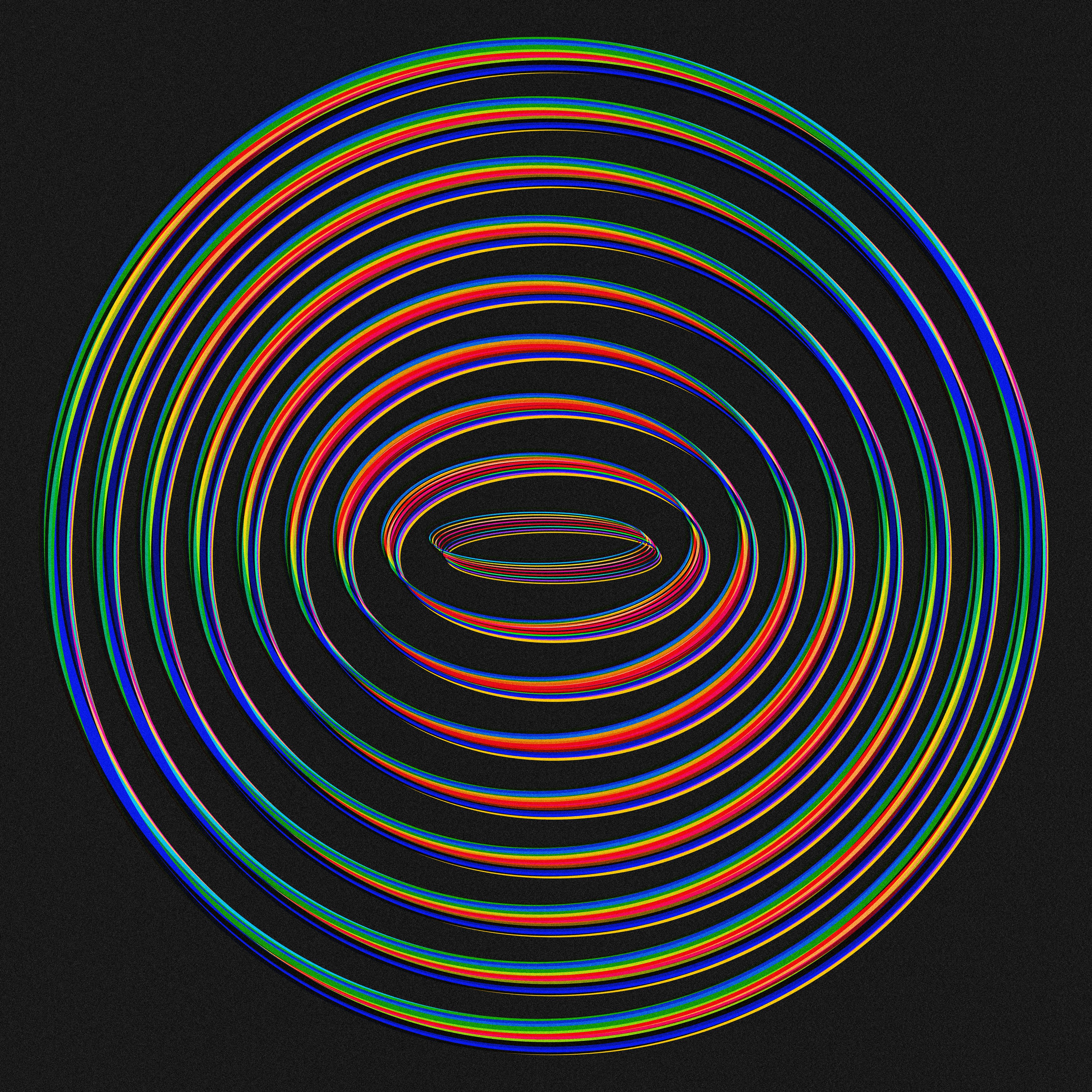 a circle of multicolored lines on a black background