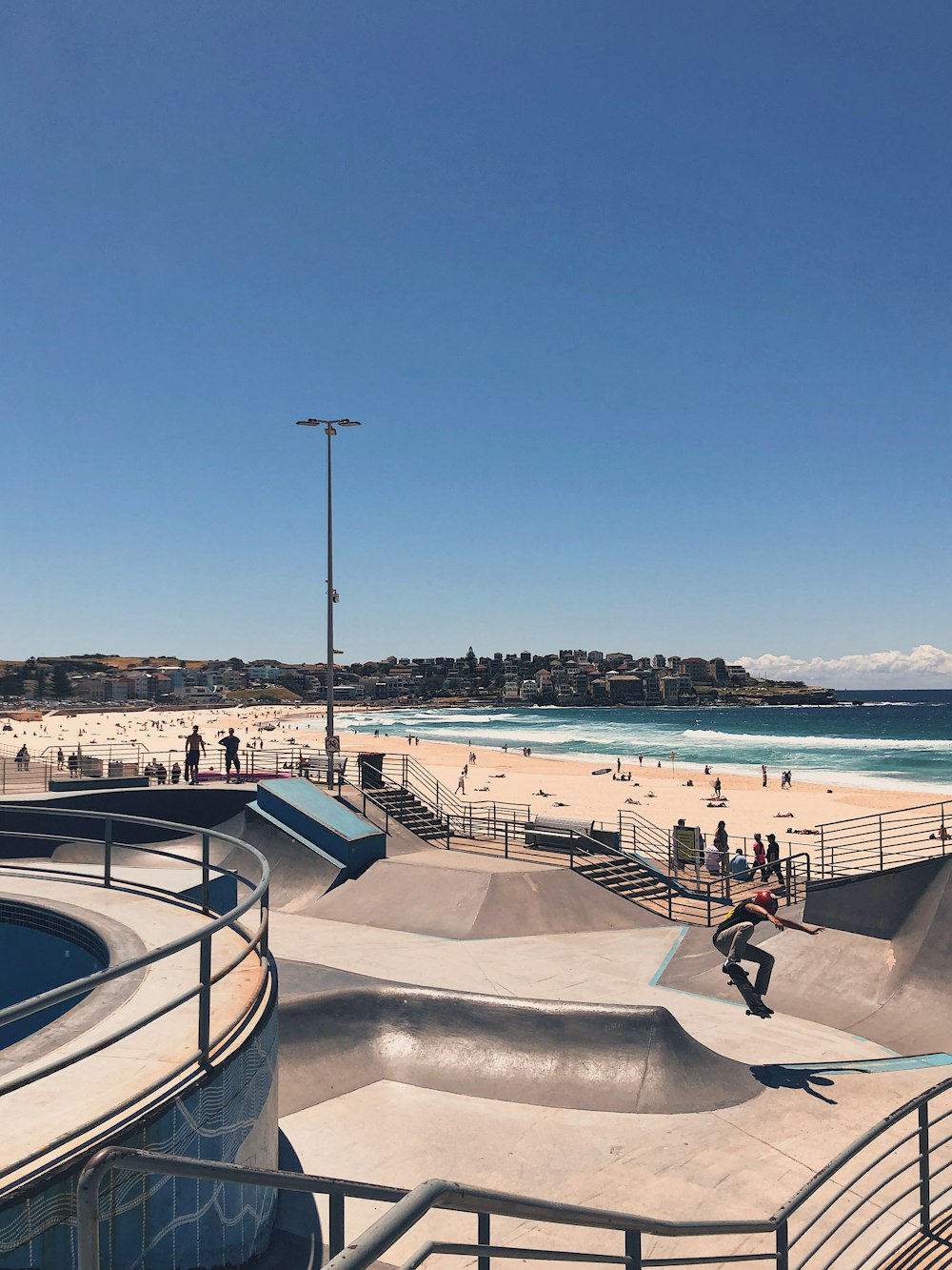 a man riding a skateboard up the side of a ramp