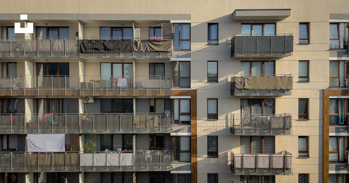 An Apartment Building With Balconies And Balconies On The Balconies An Apartment Building With Balconies And Balconies On The Balconies