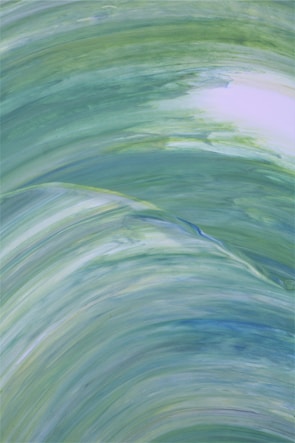 Delicate strokes of cool blues and greens creating a sense of flowing movement.