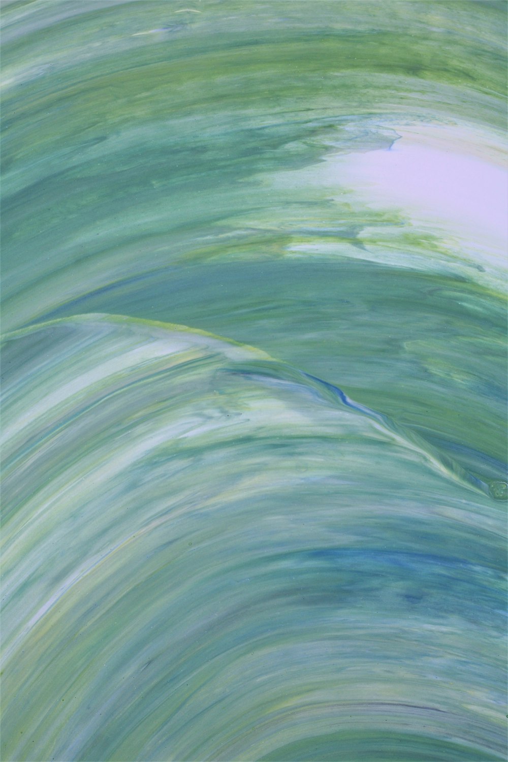 a painting of a green and blue wave