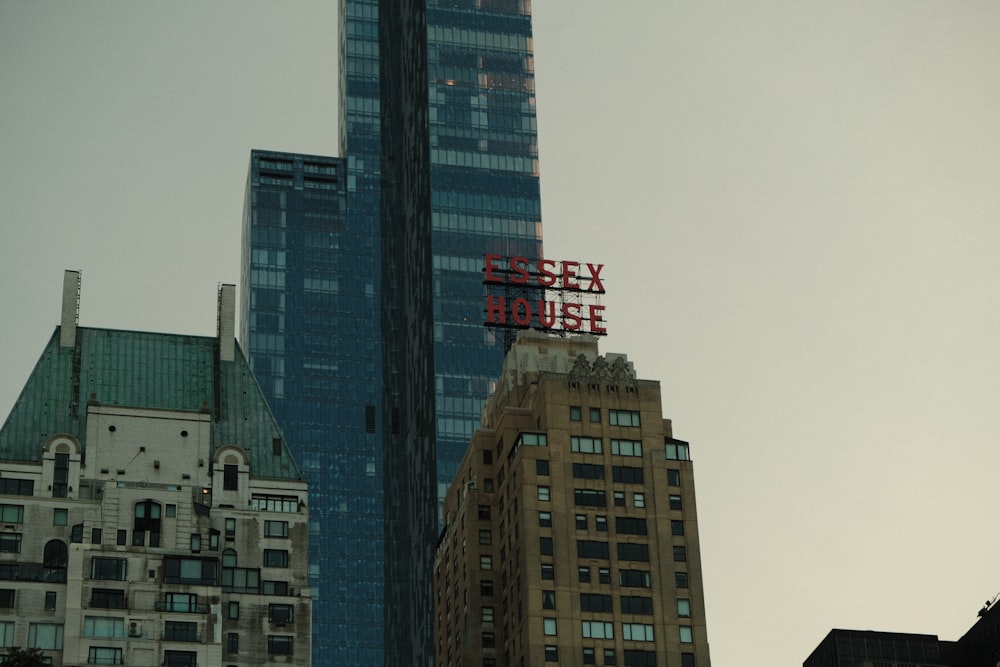 a very tall building with a sign on top of it