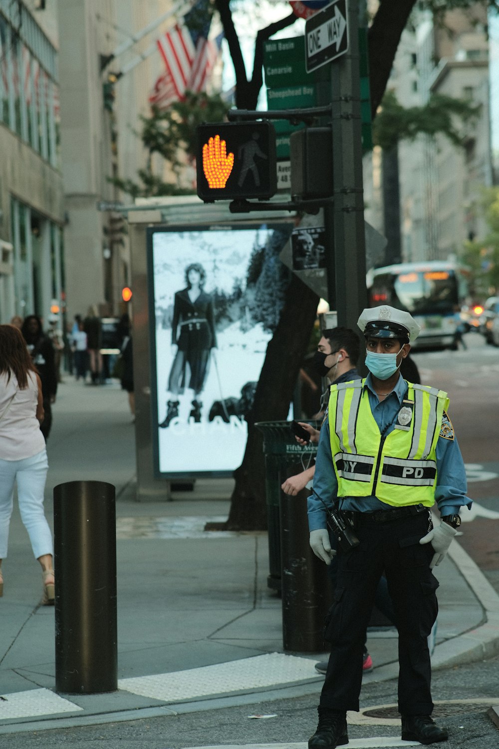 a police officer standing on the side of the road