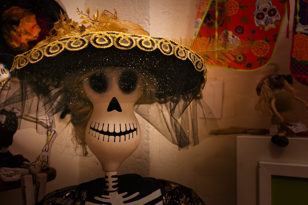 a skeleton wearing a sombrero and a veil