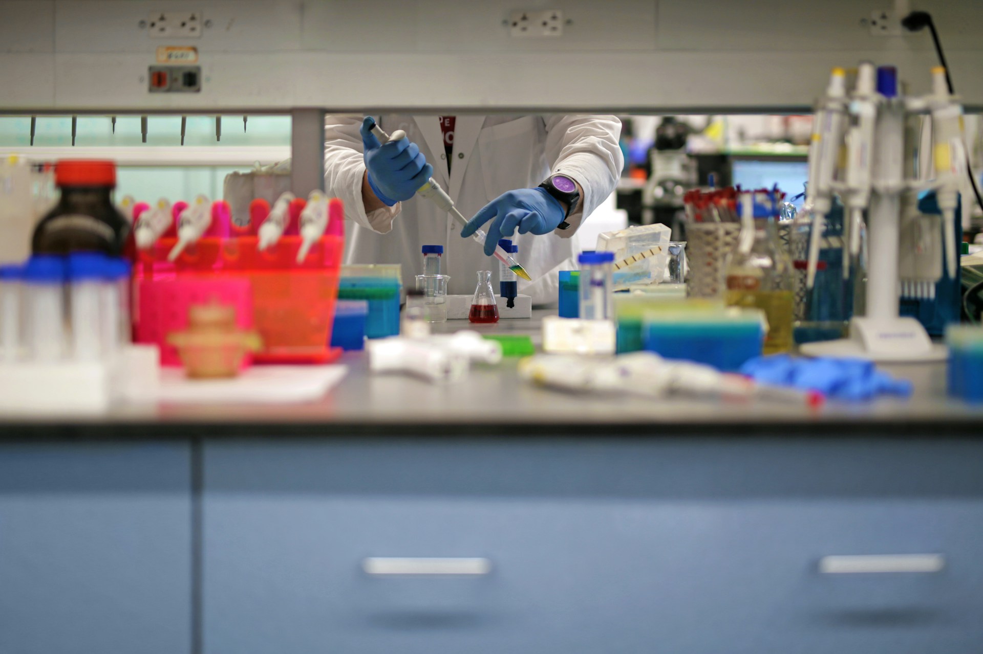 Scientist working in a laboratory setting.
