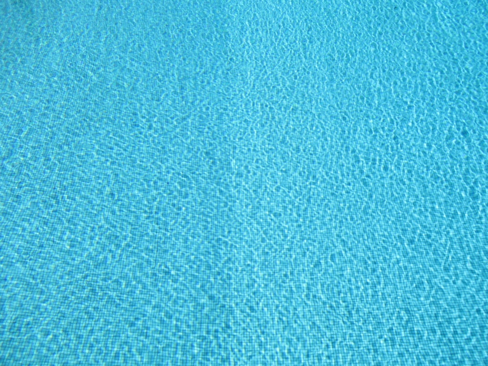 a blue swimming pool with no people in it
