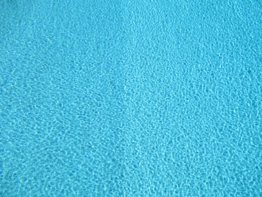 A clear blue swimming pool seen from above