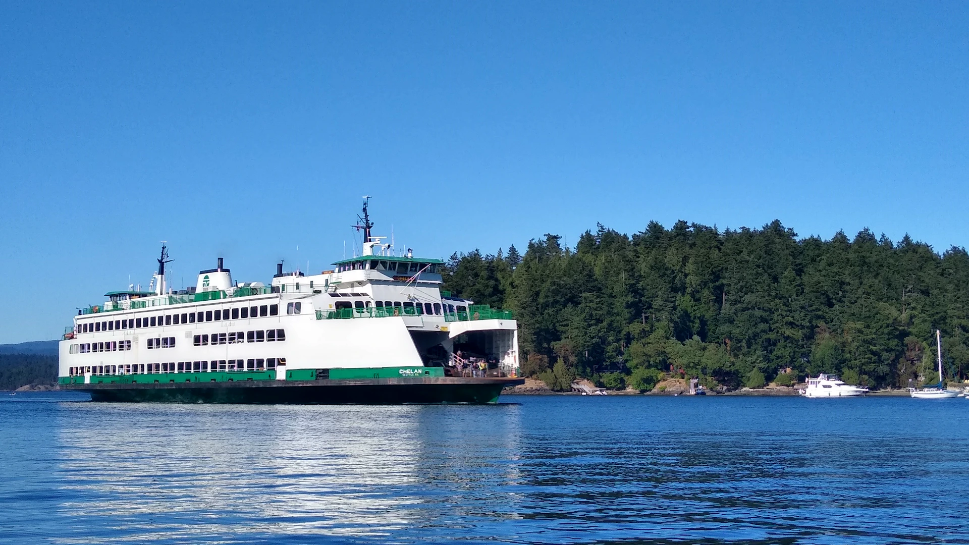 a large ferry boat on a large body of water