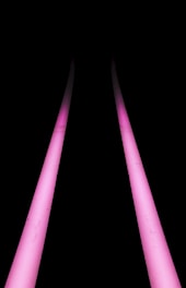a black background with three pink lights in the dark