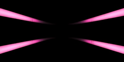 a black background with pink lights in the middle