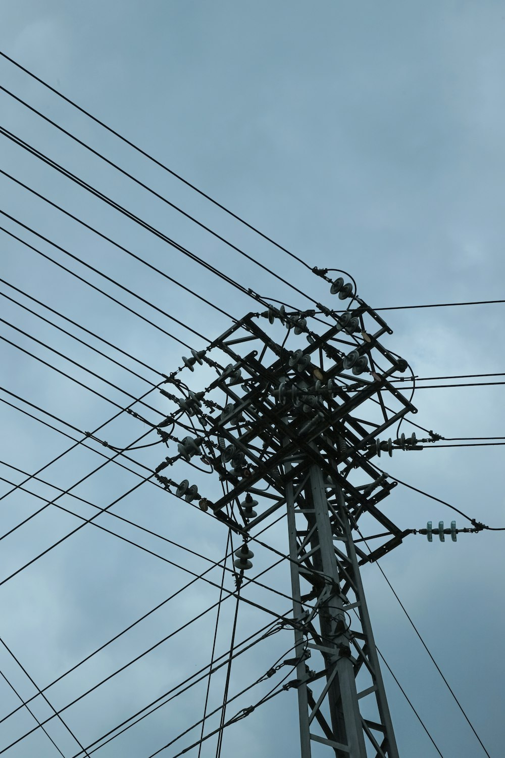 a pole with many wires and wires attached to it