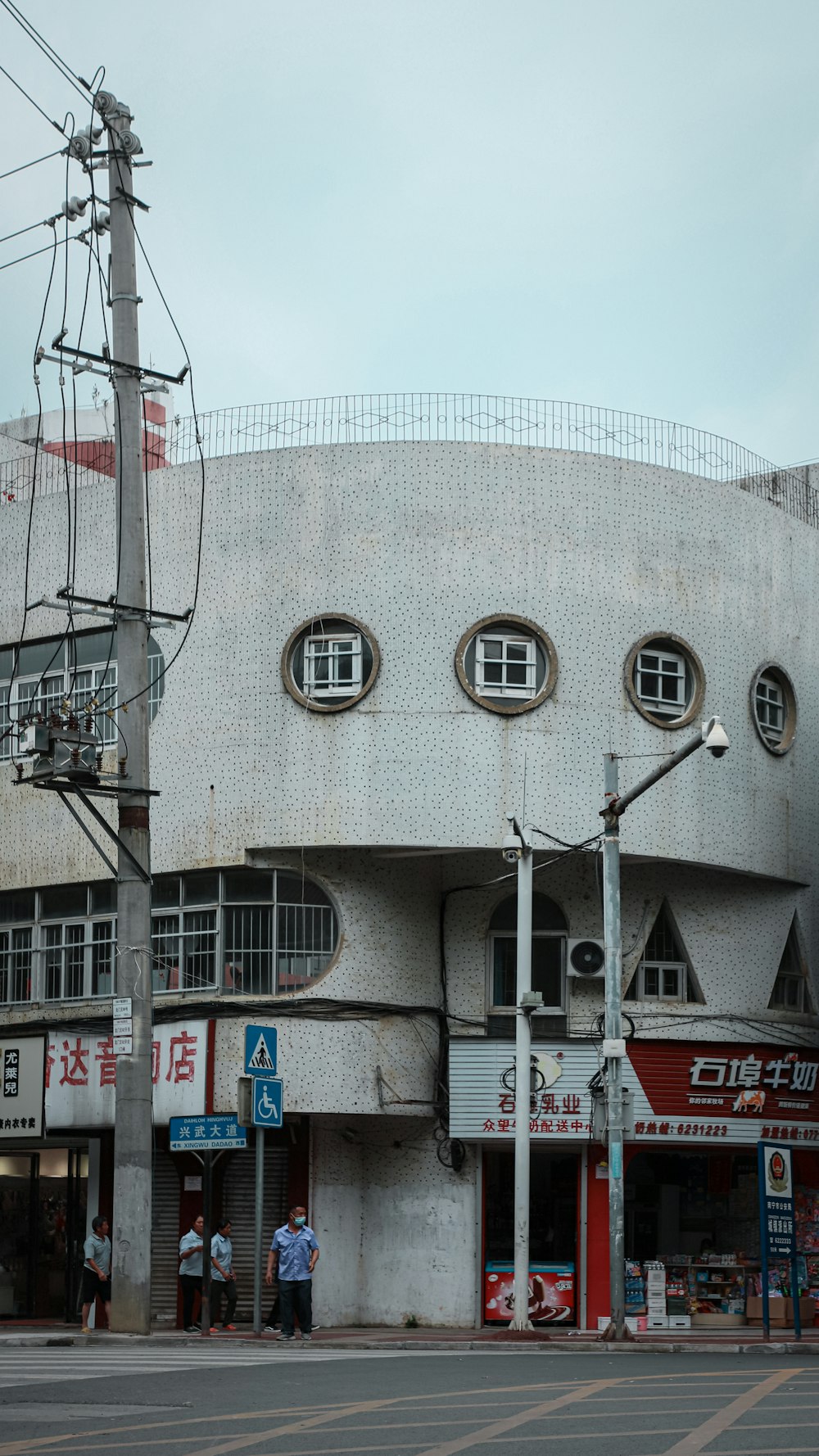 a large building with round windows on the side of it