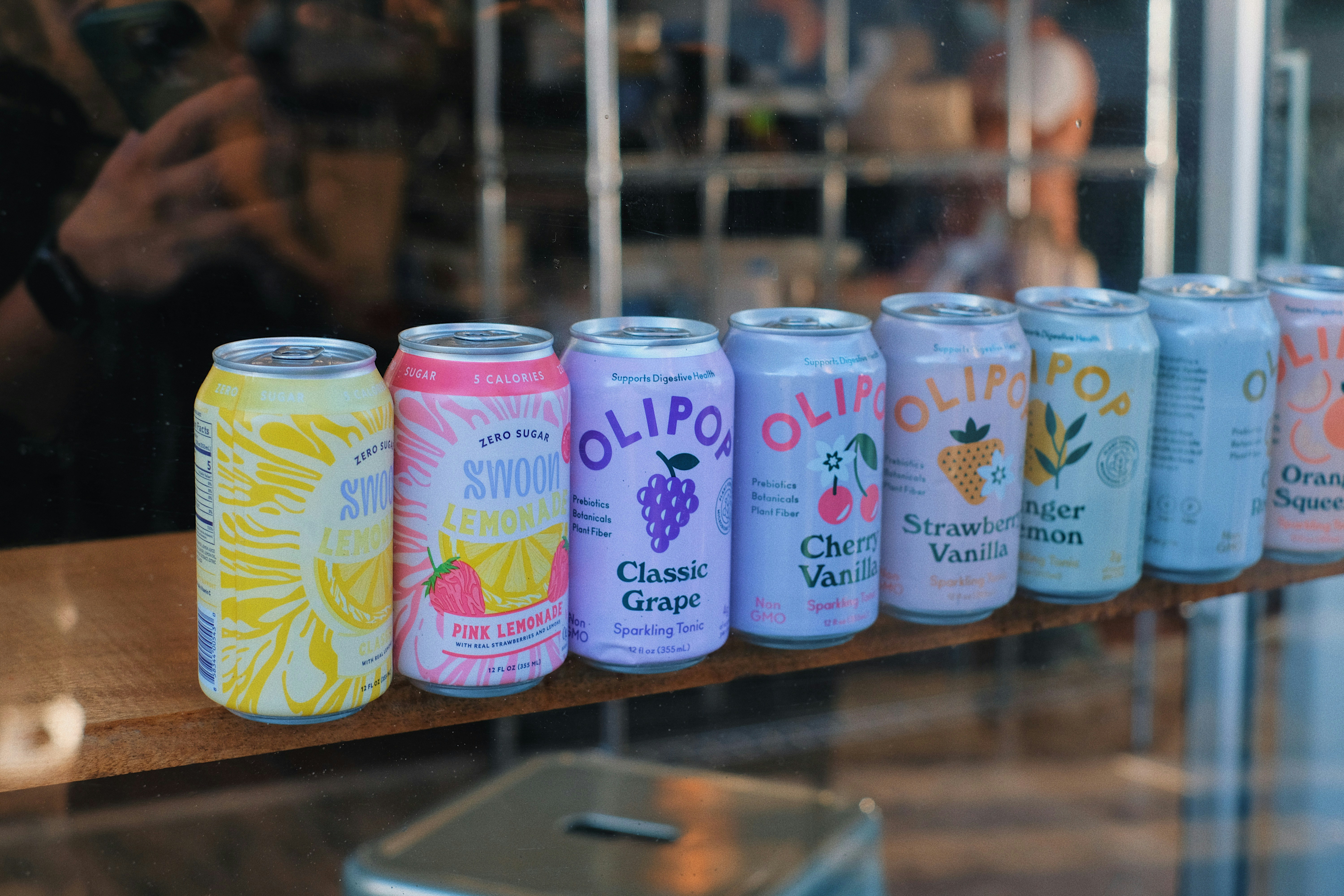 Row of flavored beverage cans
