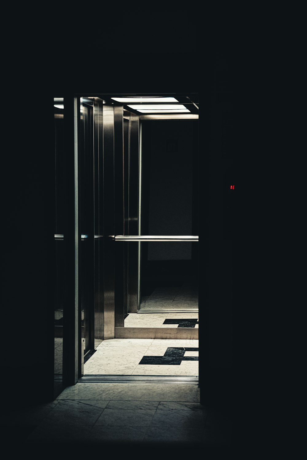an open door leading into a dimly lit room