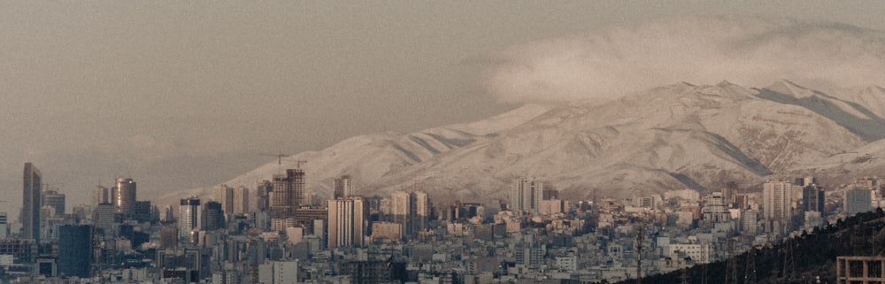 a view of a city with a mountain in the background