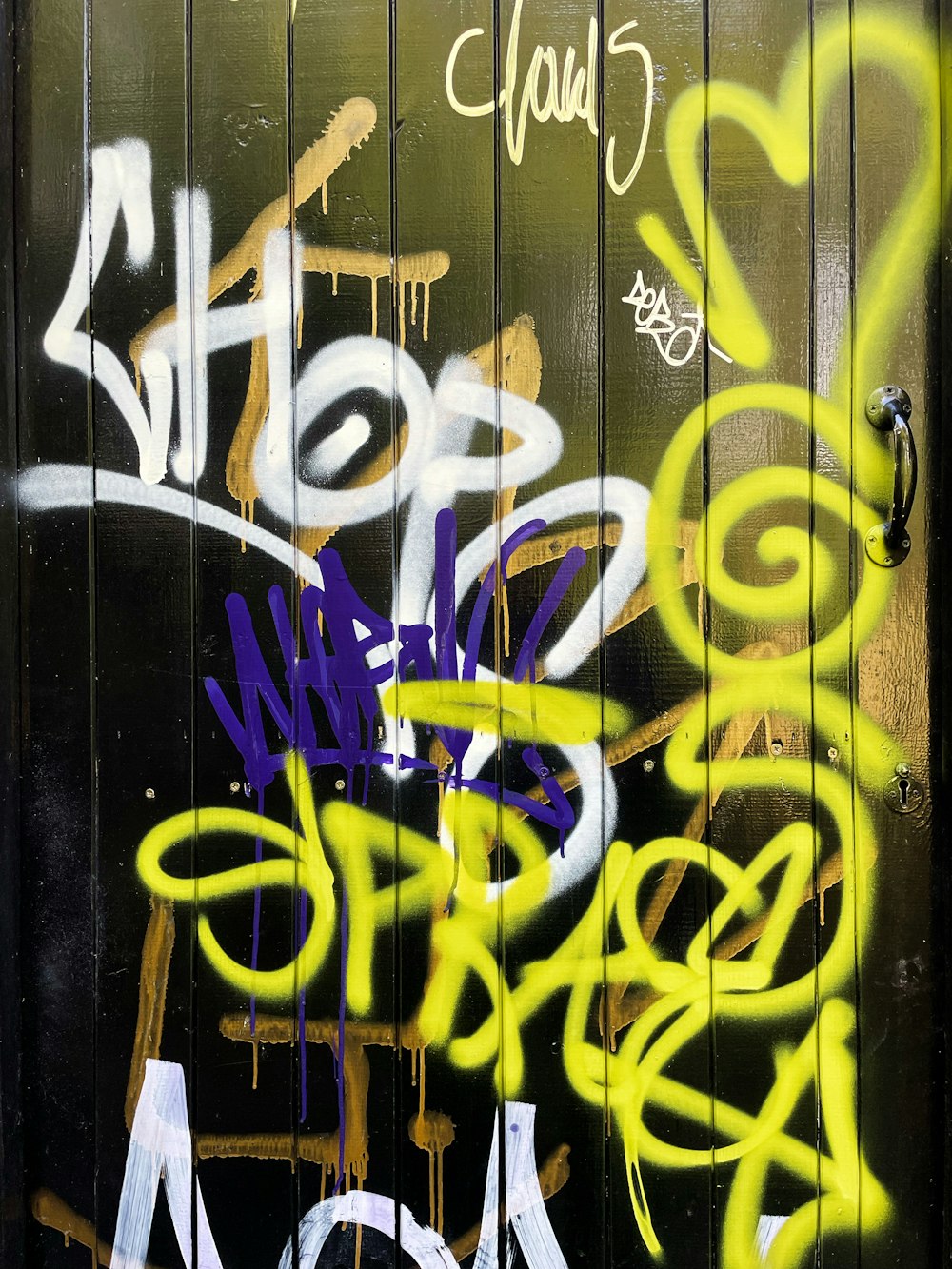 a door with some graffiti on it