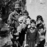 a group of people standing next to each other