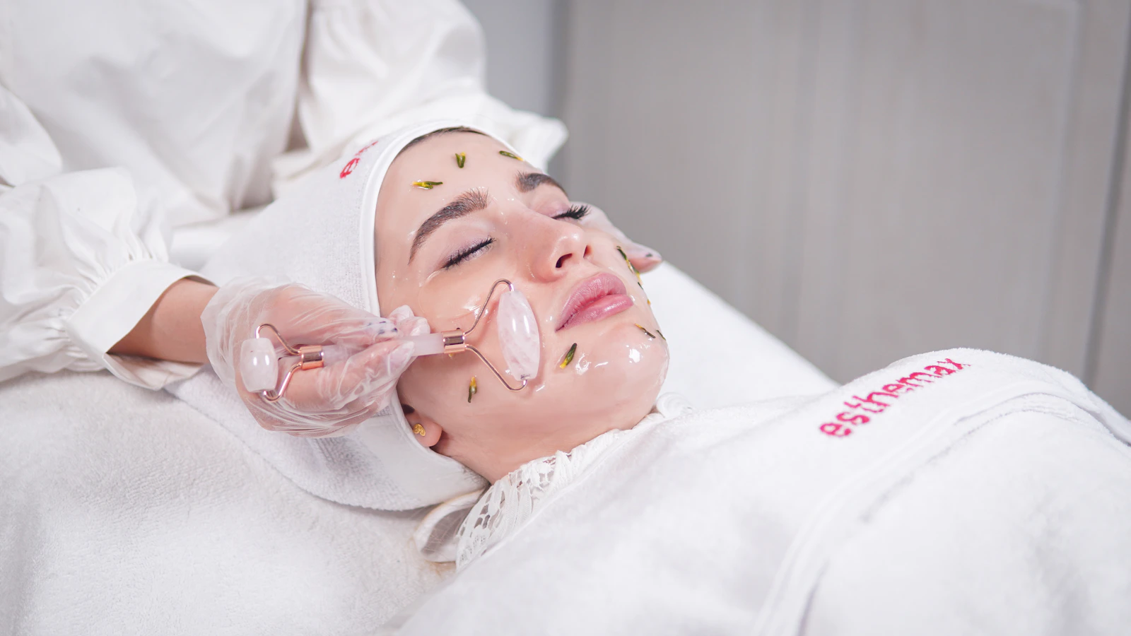 Woman receiving a facial-care treatment; editorial photograph, not a Biodance test