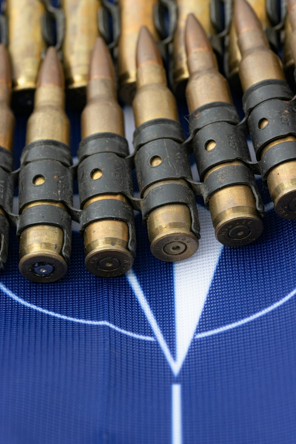 a bunch of bullet shells sitting on top of a table