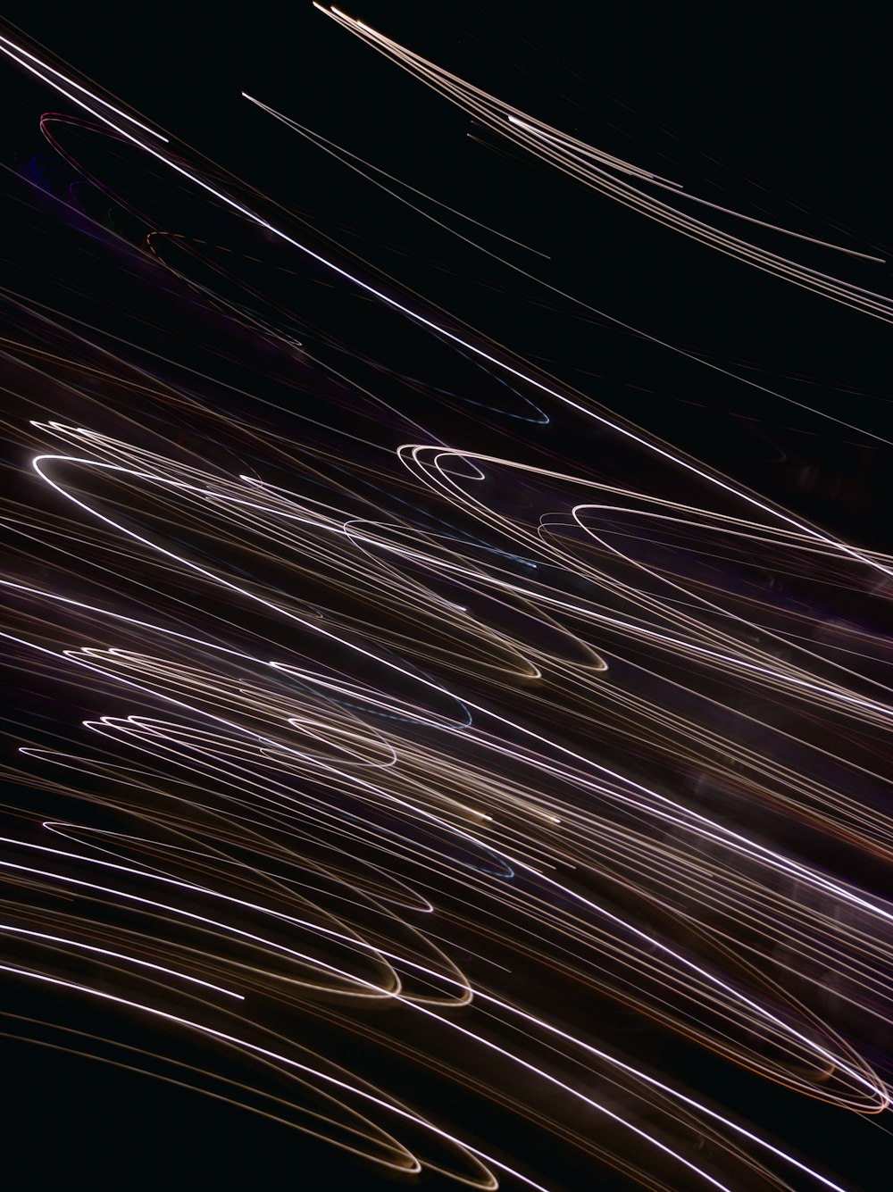 a long exposure of light streaks in the night sky