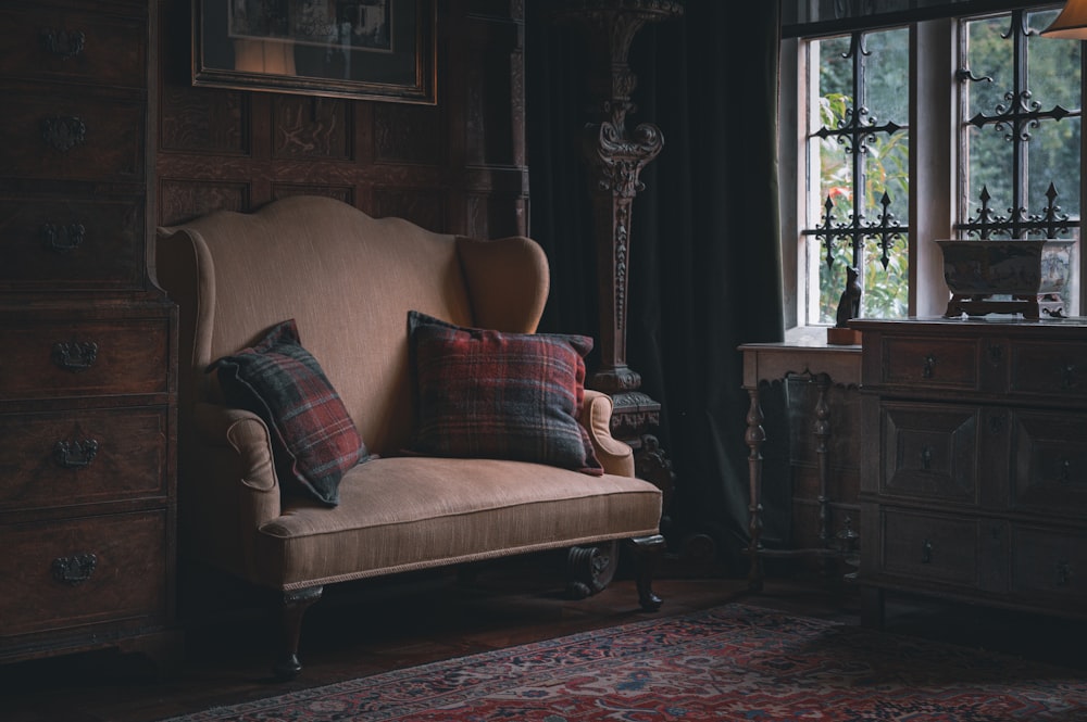 a living room with a couch and a chair