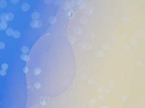 Invitation background blending soft white clouds with vibrant blue brush strokes.