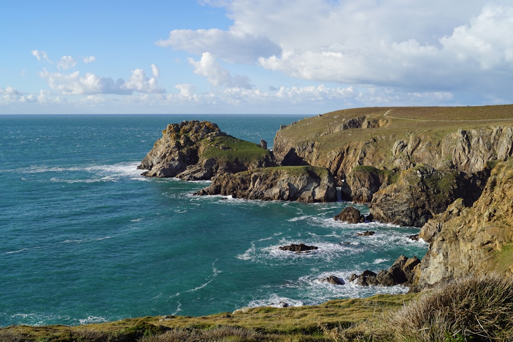 a view of the ocean from a cliff