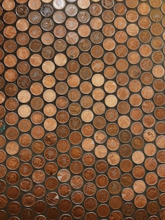 a bunch of coins that are sitting on a table