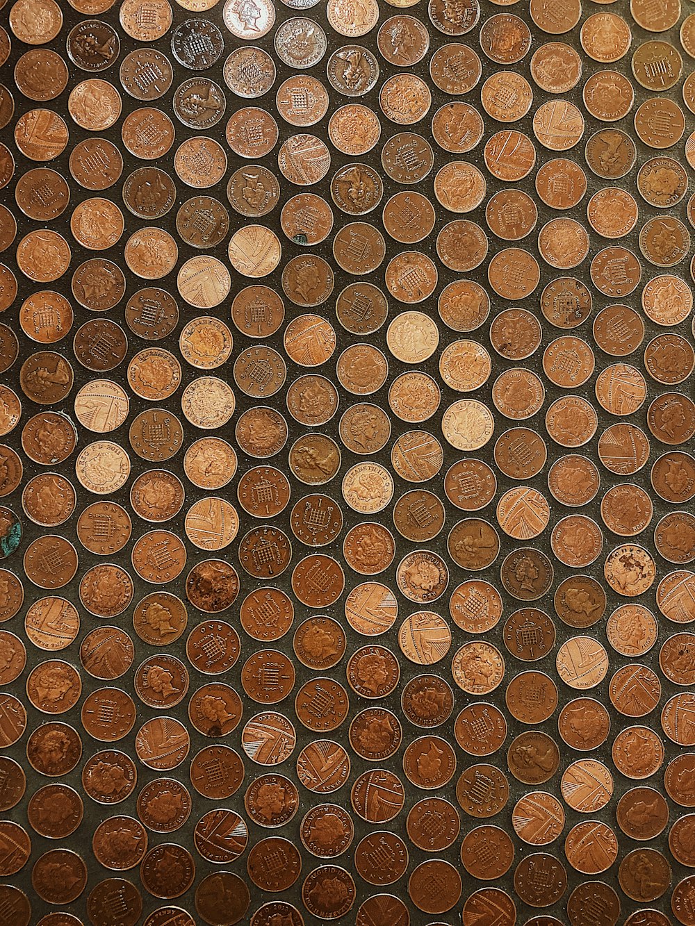 a bunch of coins that are sitting on a table