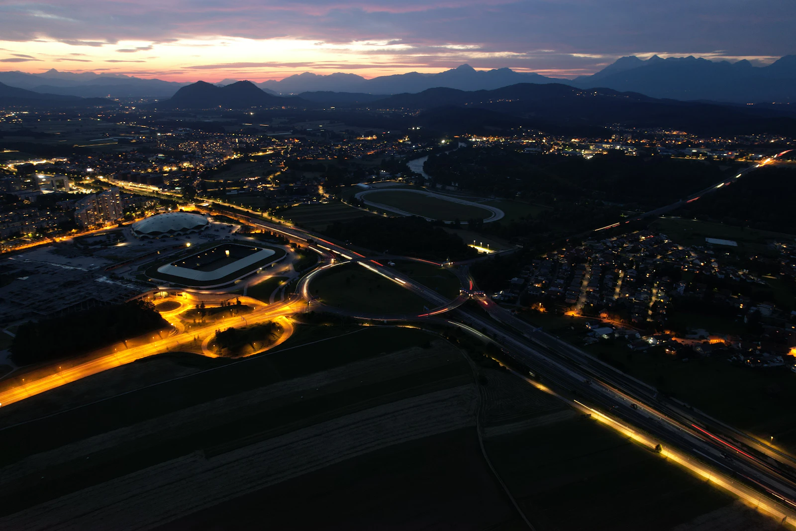 Motorway interchange illuminated at night near Ljubljana