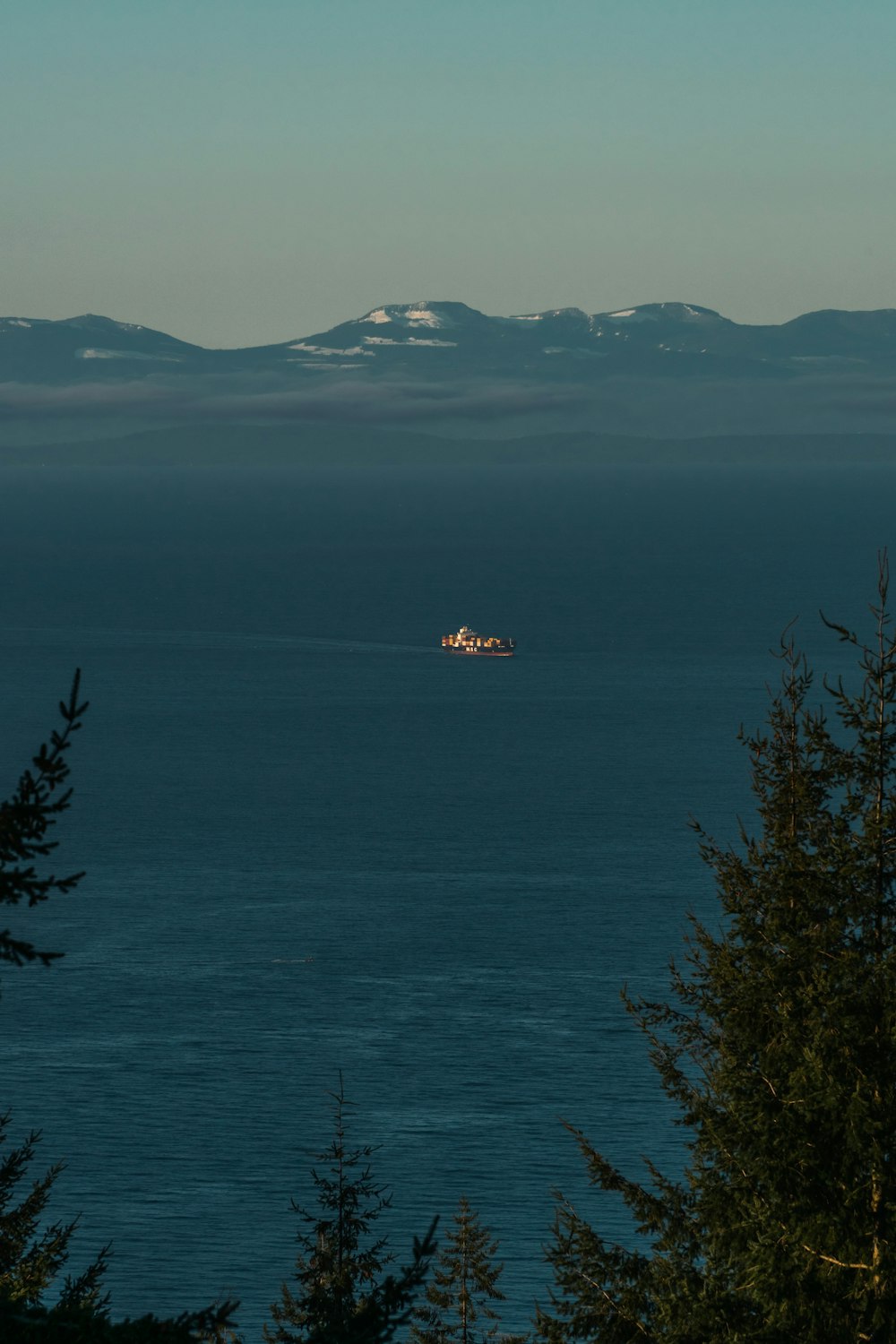 a boat is in the middle of the ocean