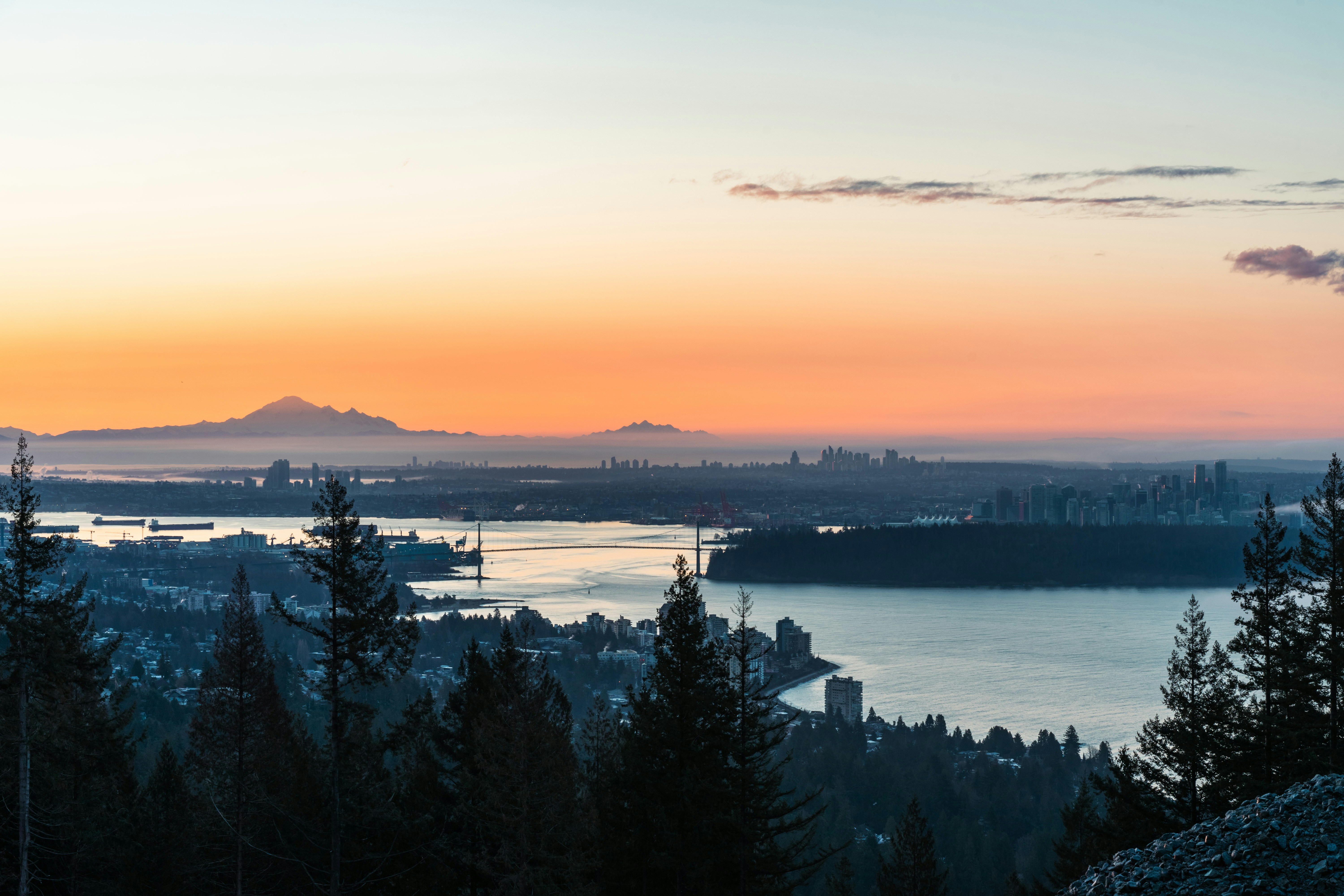 Homeowner in the Lower Mainland reviewing energy bills and rebate paperwork - is a heat pump worth it in the lower mainland